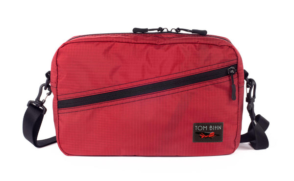A Packing Cube Shoulder Bag in Sangria (red with light red grid) 210 Cerylon with shoulder straps
